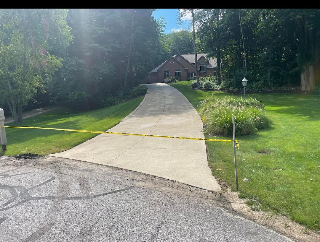 Driveway cleaning and sealing